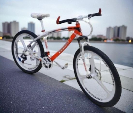 صورة دراجة رياضية مقاس 26 برتقالي